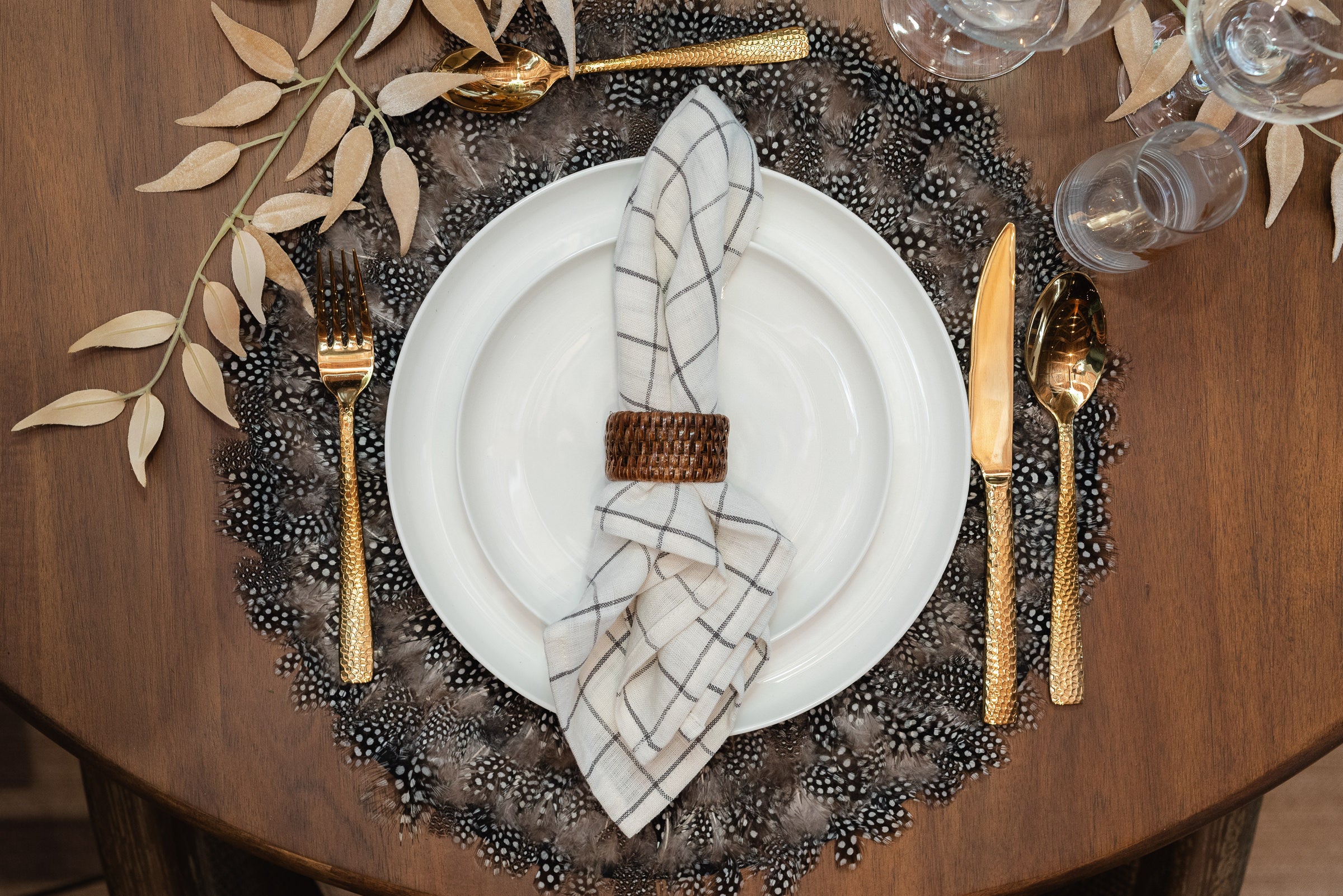 Cozy Fall table with sheepskin throw in moody light by Addison West