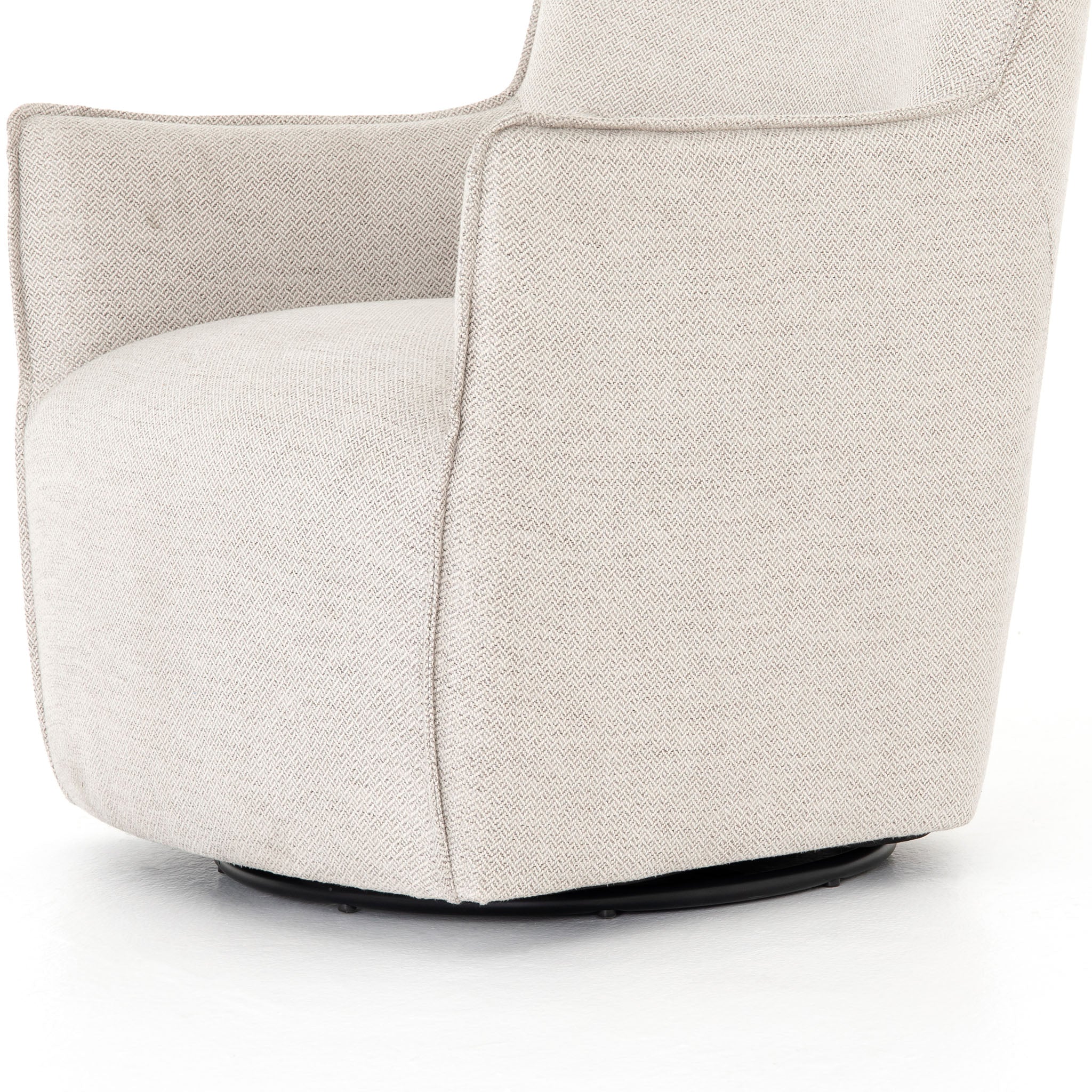 Light grey small swivel armchair by four hands furniture on a white background