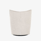 Light grey small swivel armchair by four hands furniture on a white background