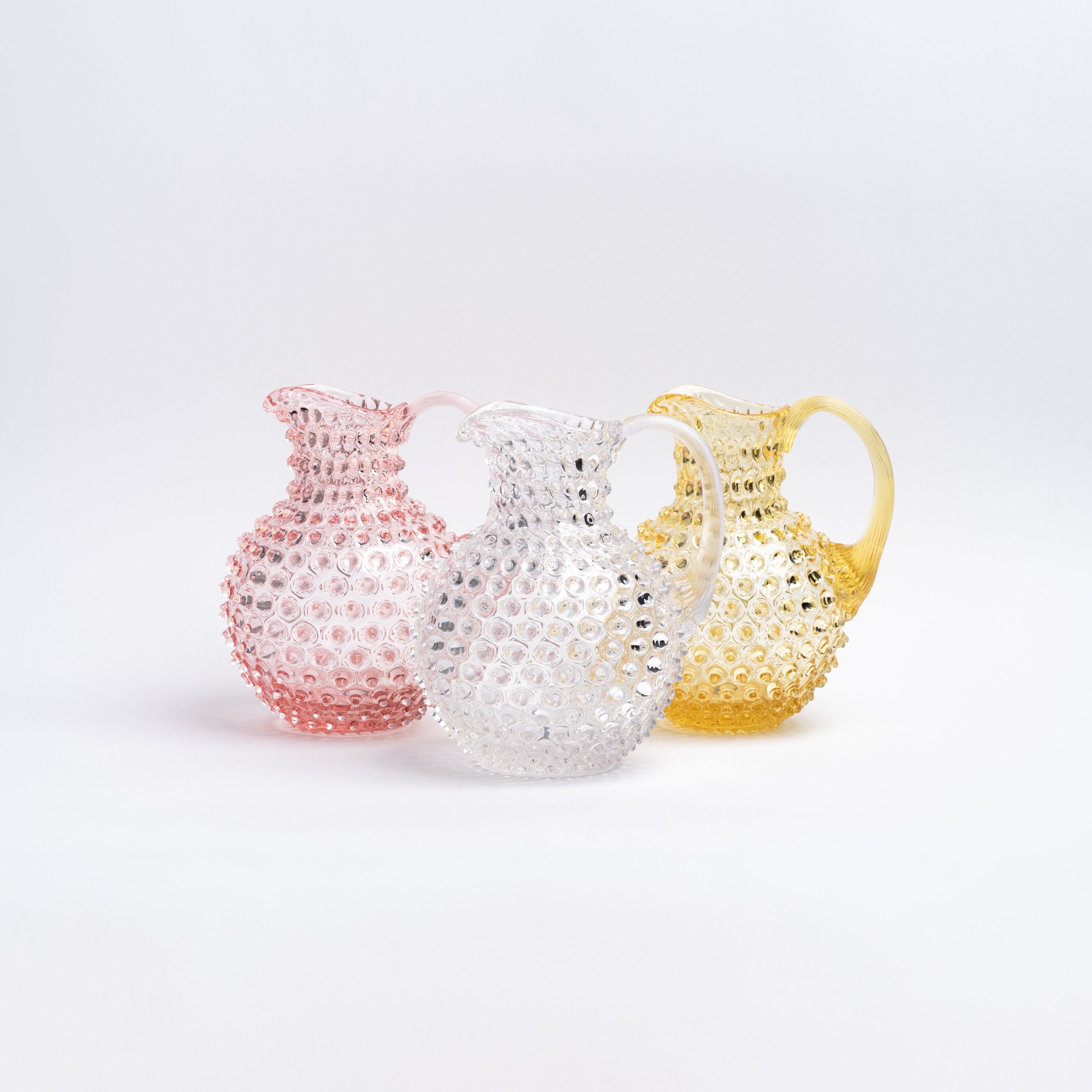 Addison West Chehoma glass hobnail pitchers