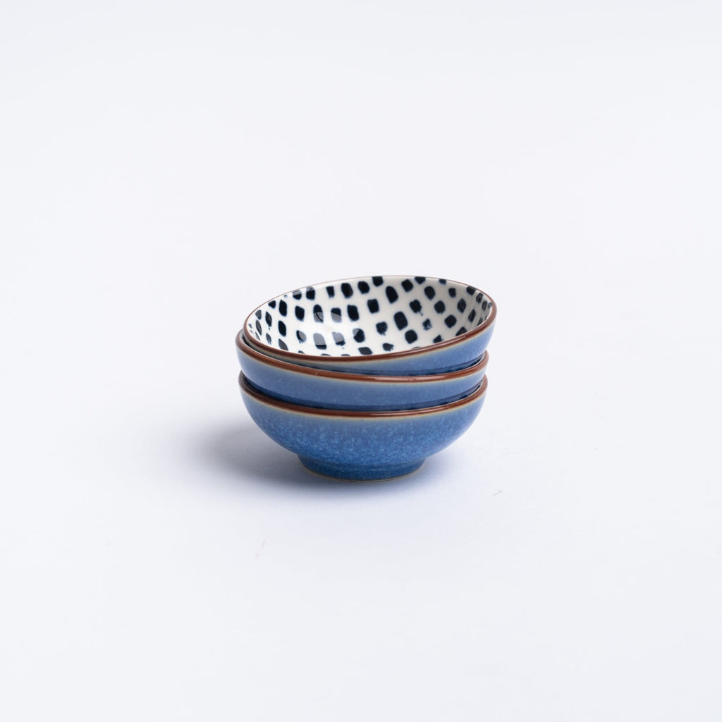 Small indigo bowls on a white background