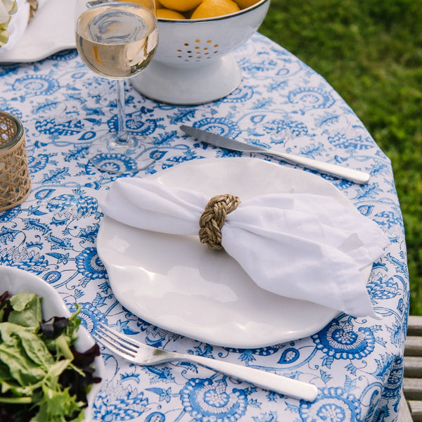 Beatriz Ball Havana 11" melamine white Dinner Plate on an outdoor dining table