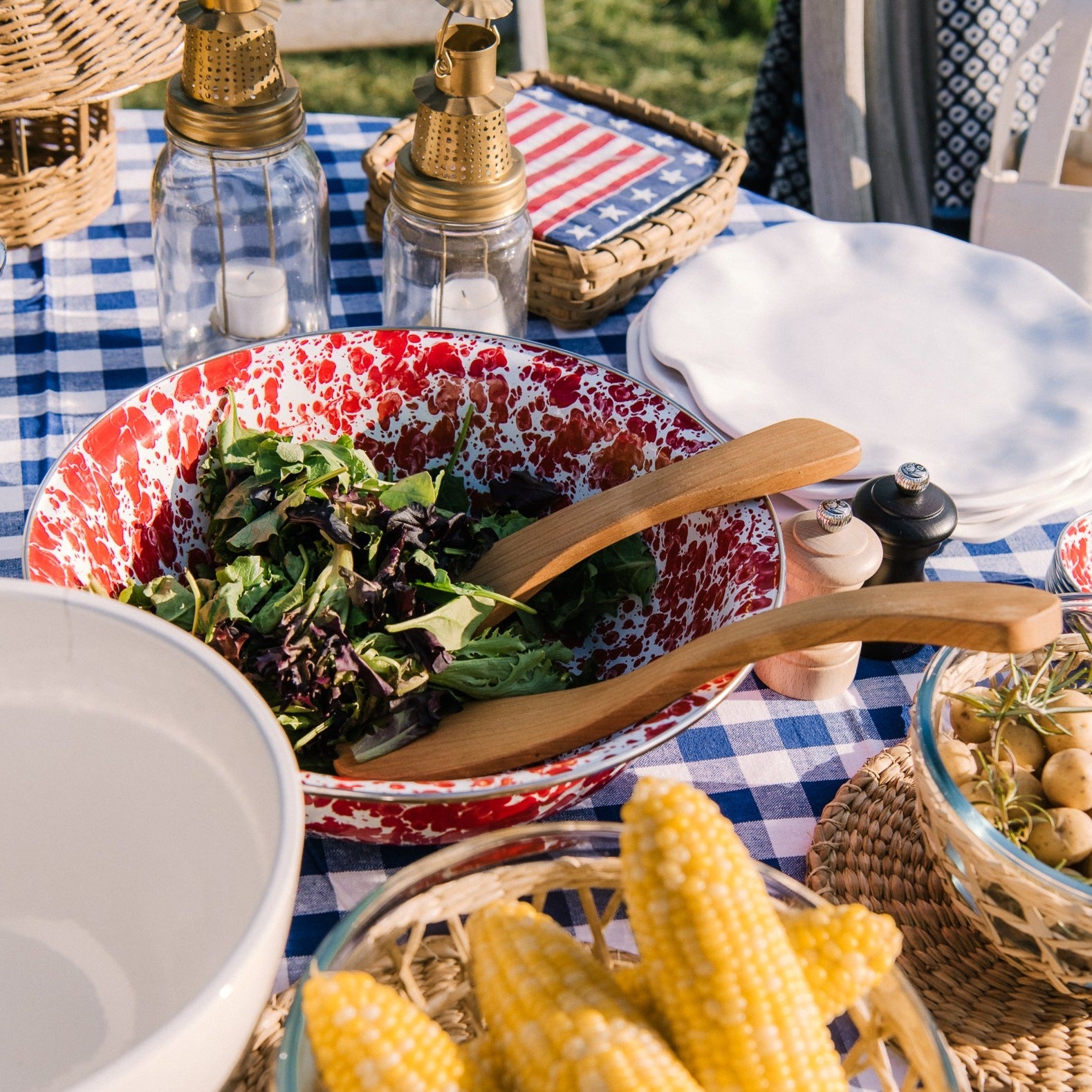 Golden Rabbit brand Red Swirl Serving Basin on an outdoor dining table