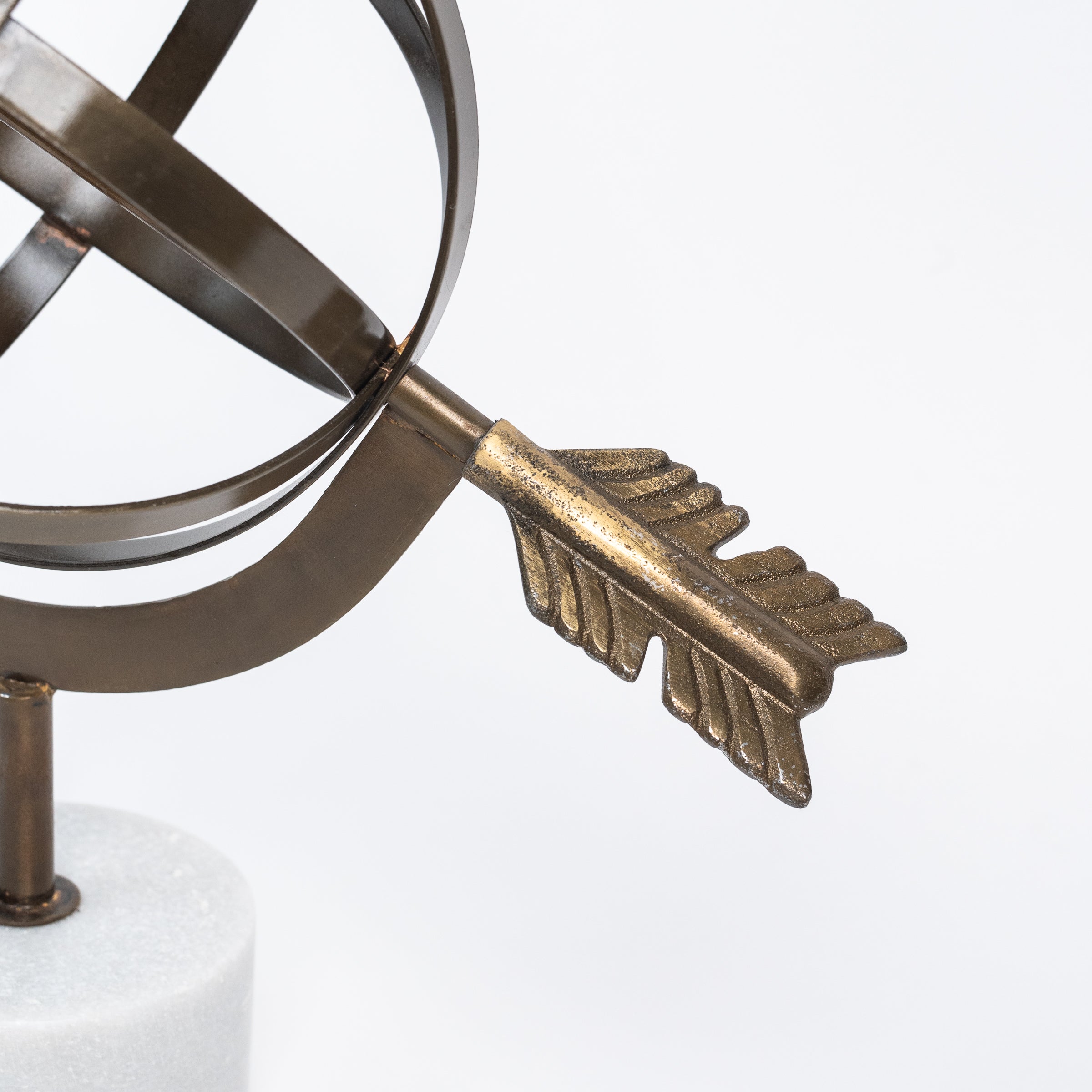 Armillary Sphere brass and marble decor on a white background