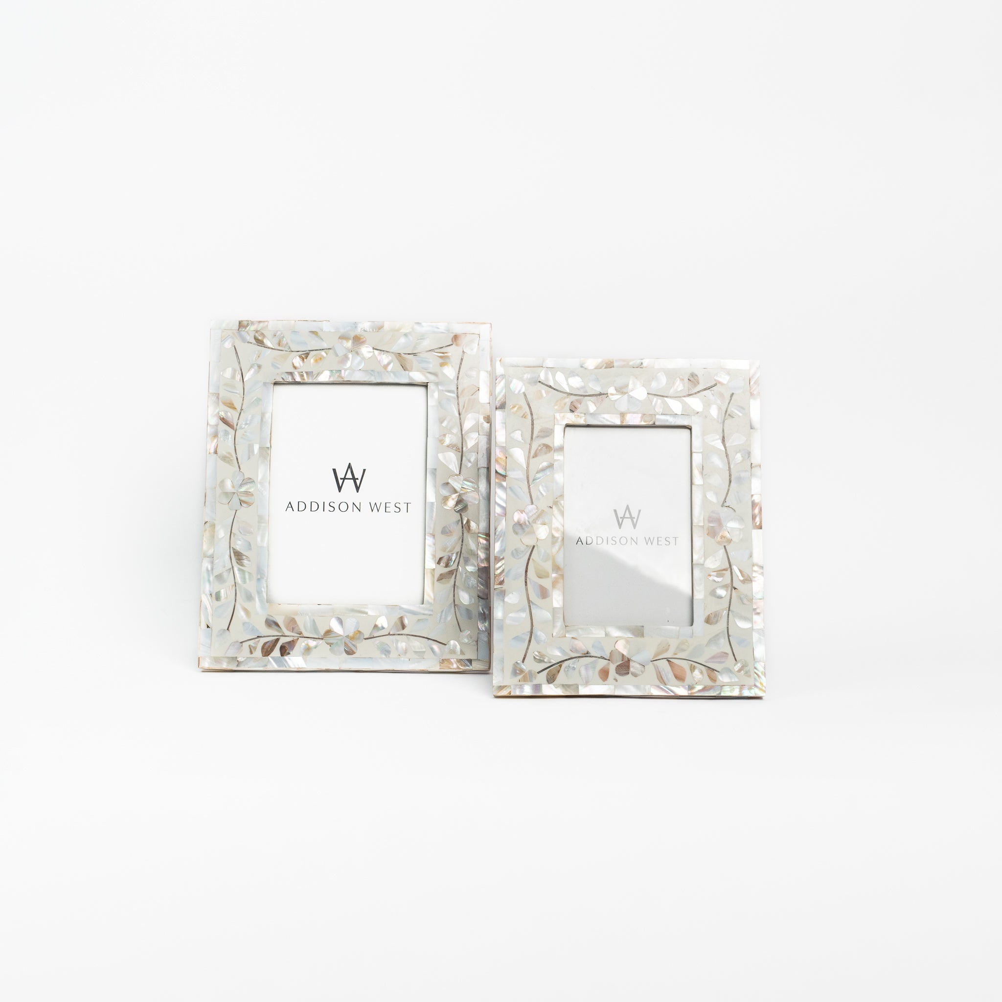 Mother of pearl picture frames on a white background