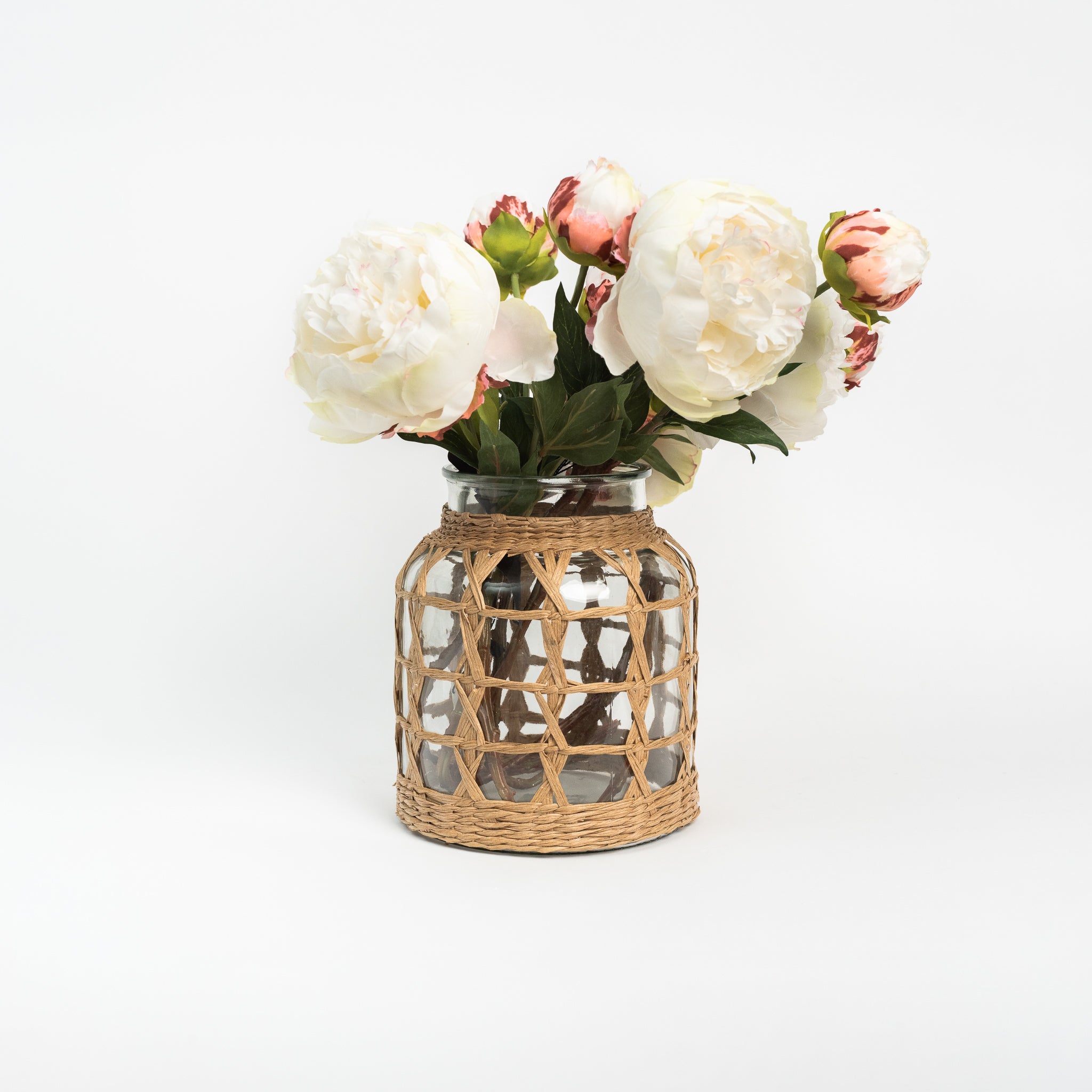 Seagrass Wrap Lattice Vase large on a white background with flowers