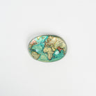 Glass Map Paperweight on a white background