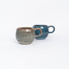 Wrap Your Hands Around Me Mug in blue and brown on a white background