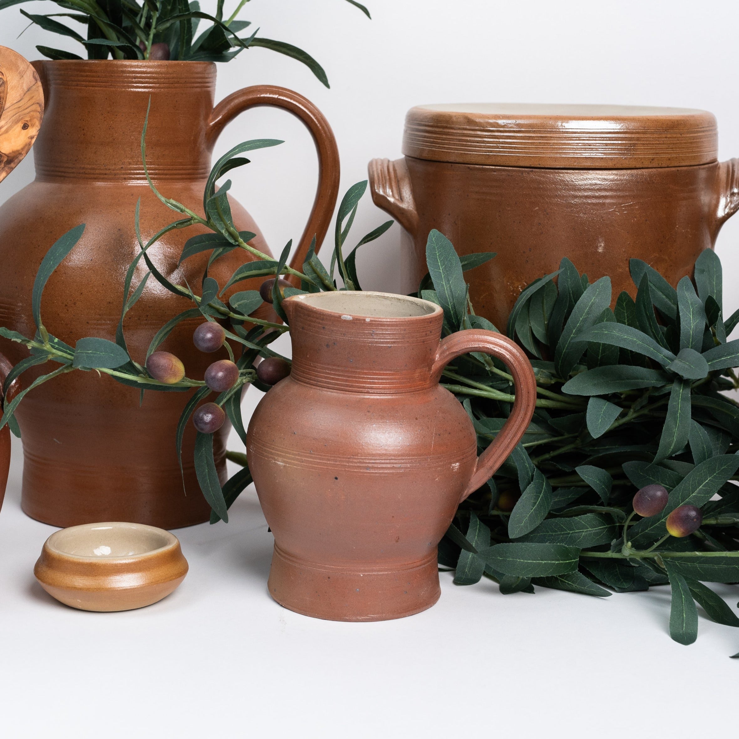 Poterie Renault pottery brown water pitcher on a white background