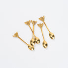 Bee Brass Spoons on a white background