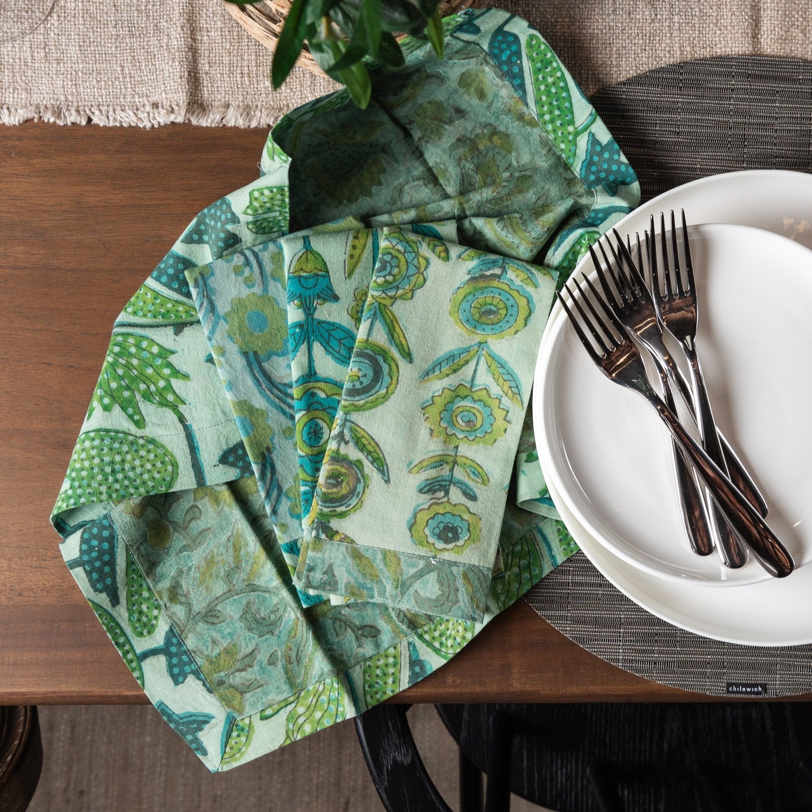 Vermont Handmade Napkins in Green on a dining table at Addison West