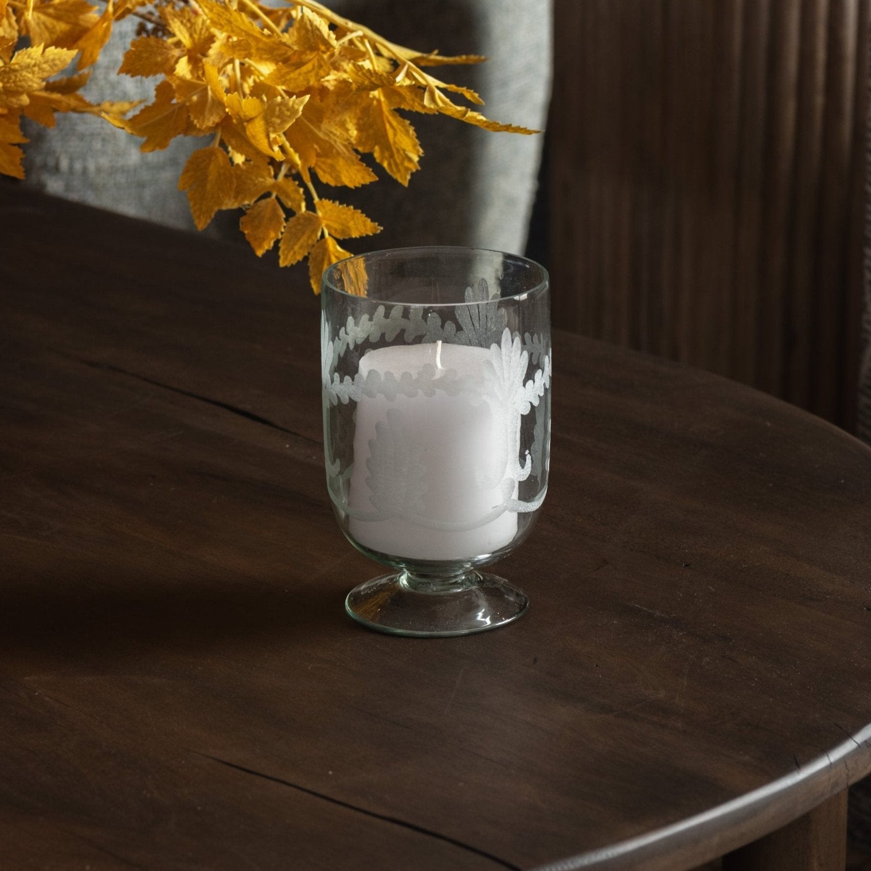 Florence Footed Vase on a dark wood table at Addison West