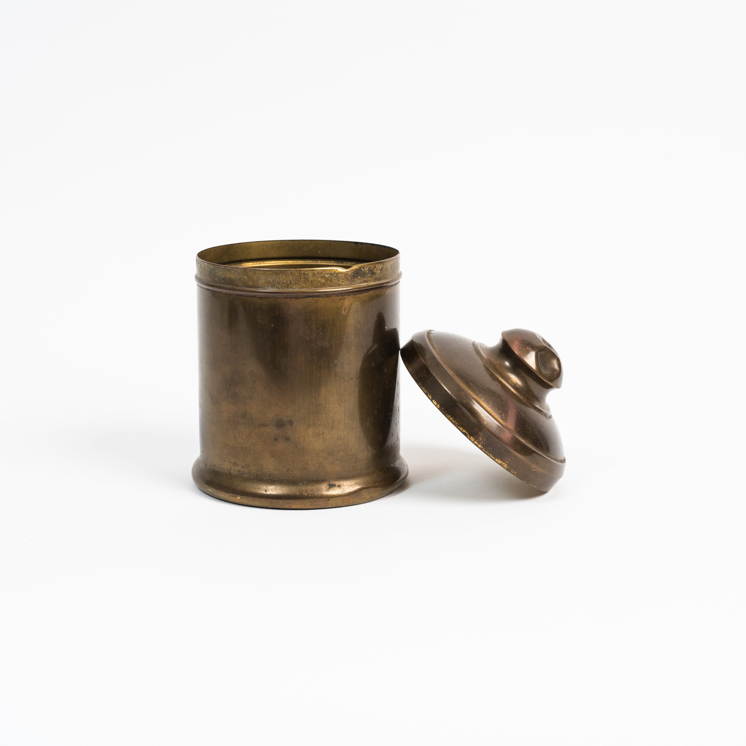 Vintage Brass Tobacco Tin on a white background at Addison West