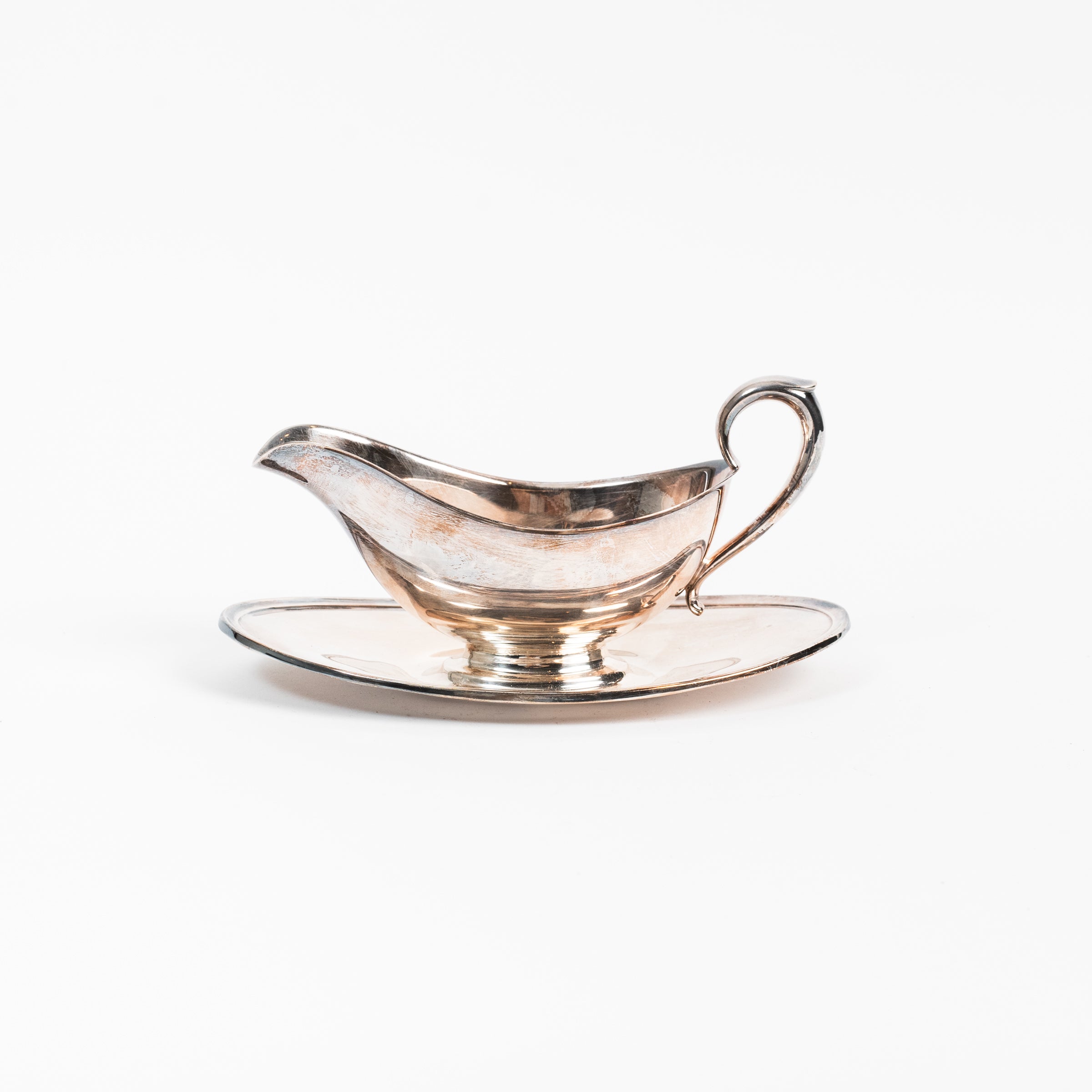 Vintage Silver Gravy Boat on a white background at Addison West