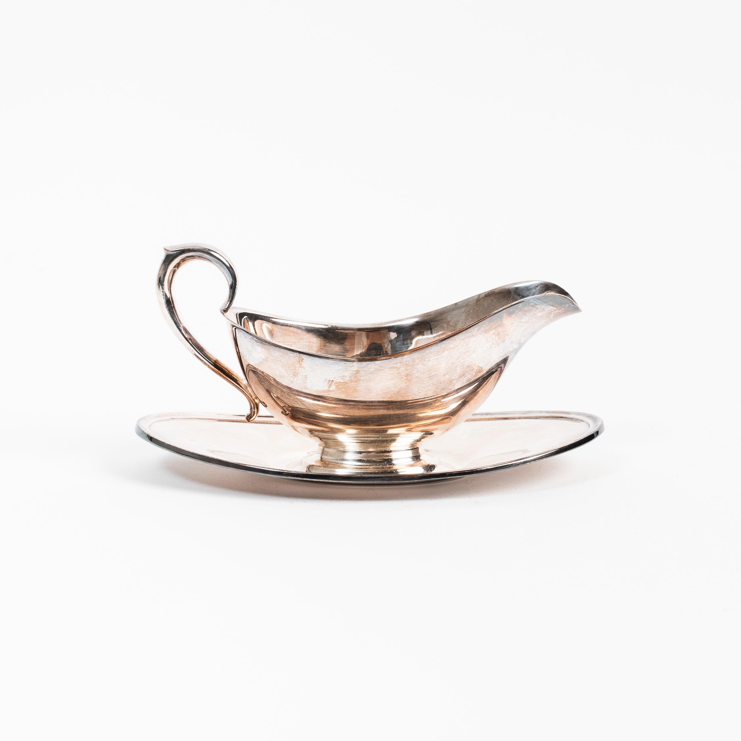 Vintage Silver Gravy Boat on a white background at Addison West