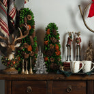 Apple & Pinecone Tree - Large on a holiday styled table at Addison West