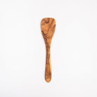 Large Olive Wood Spatula on a white background at Addison West