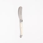 Laguiole Ivory Mini Spreader on a white background at Addison West