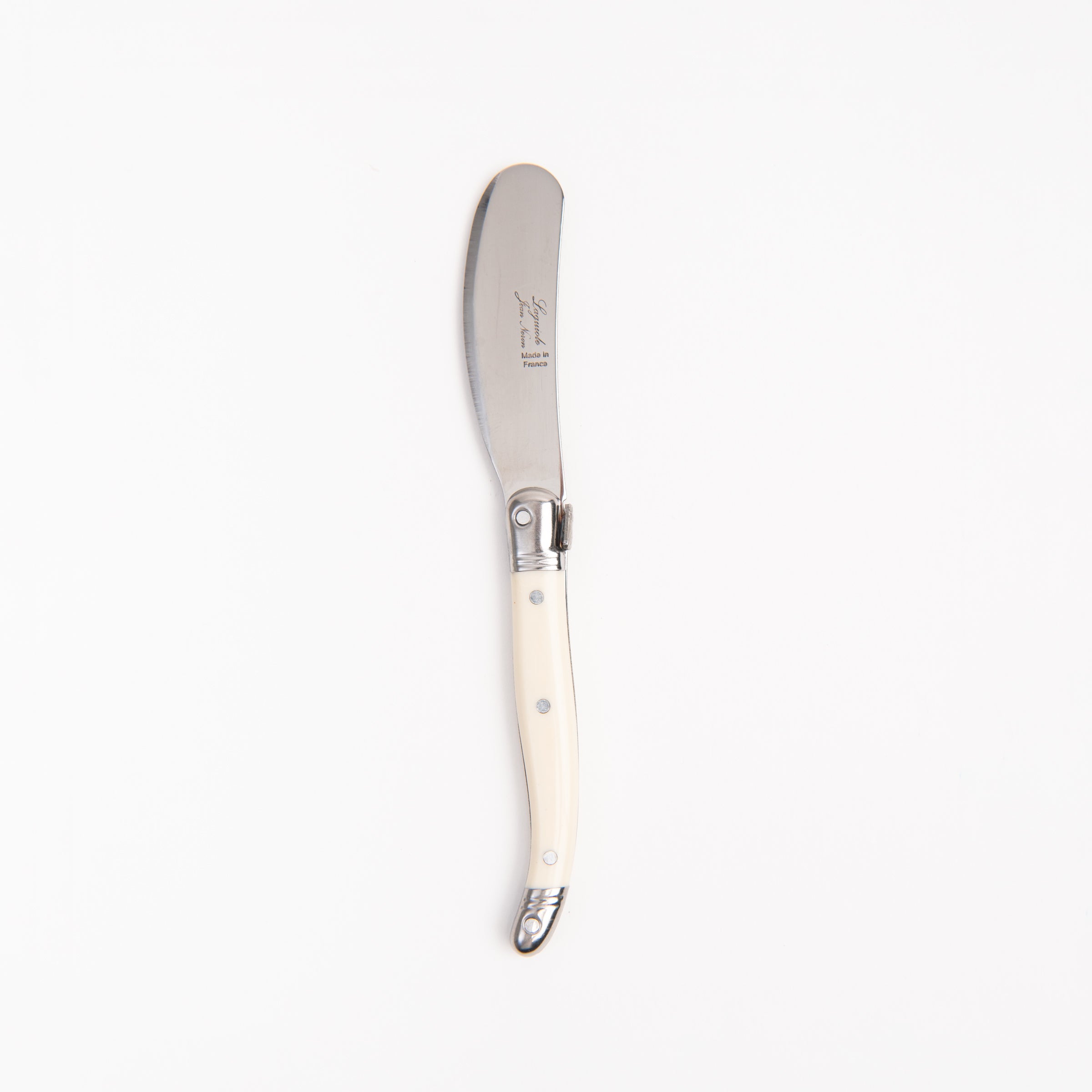 Laguiole Ivory Mini Spreader on a white background at Addison West