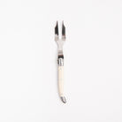 Laguiole Ivory Mini Cheese Fork on a white background at Addison West