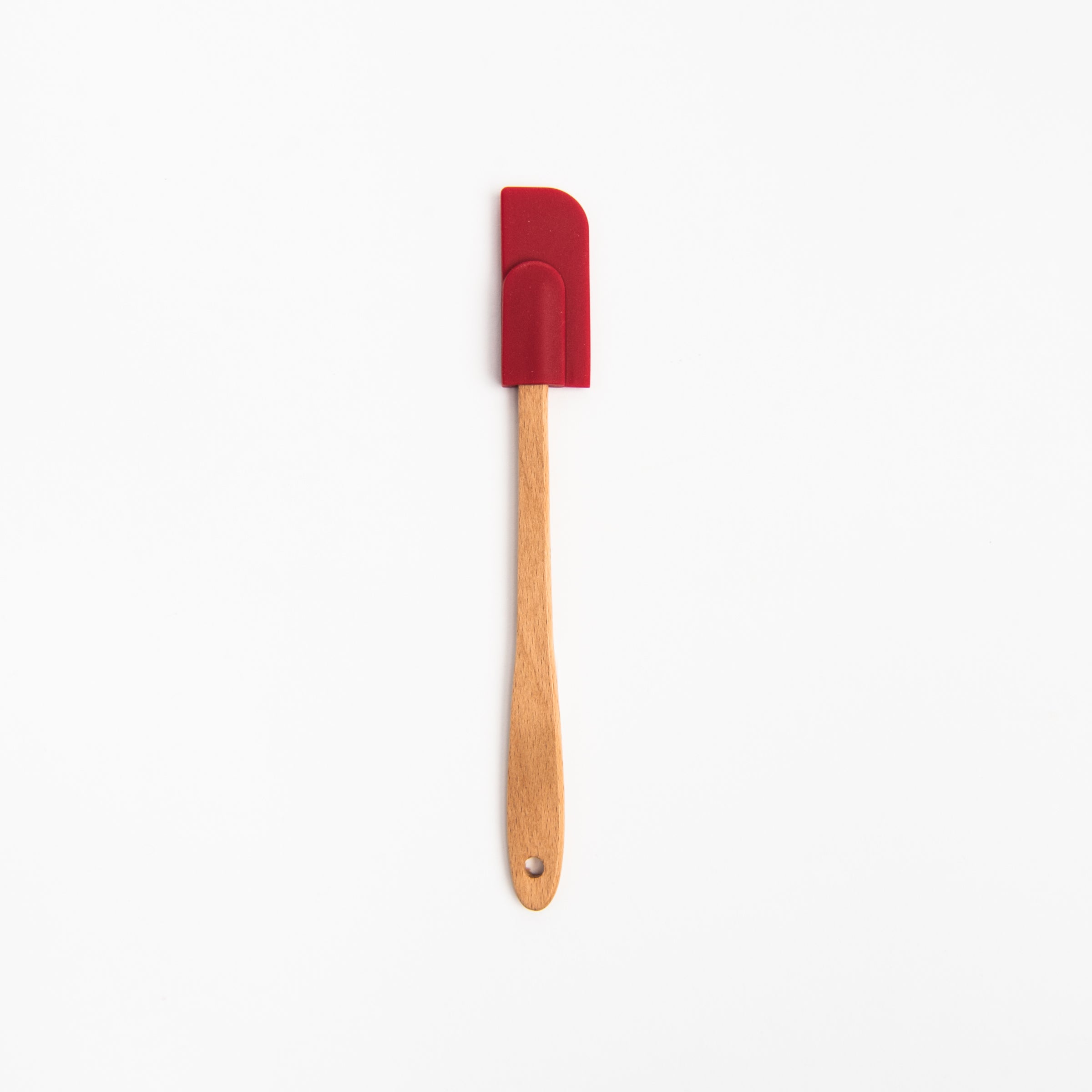 Mini Silicone Spatula - Red on a white background at Addison West