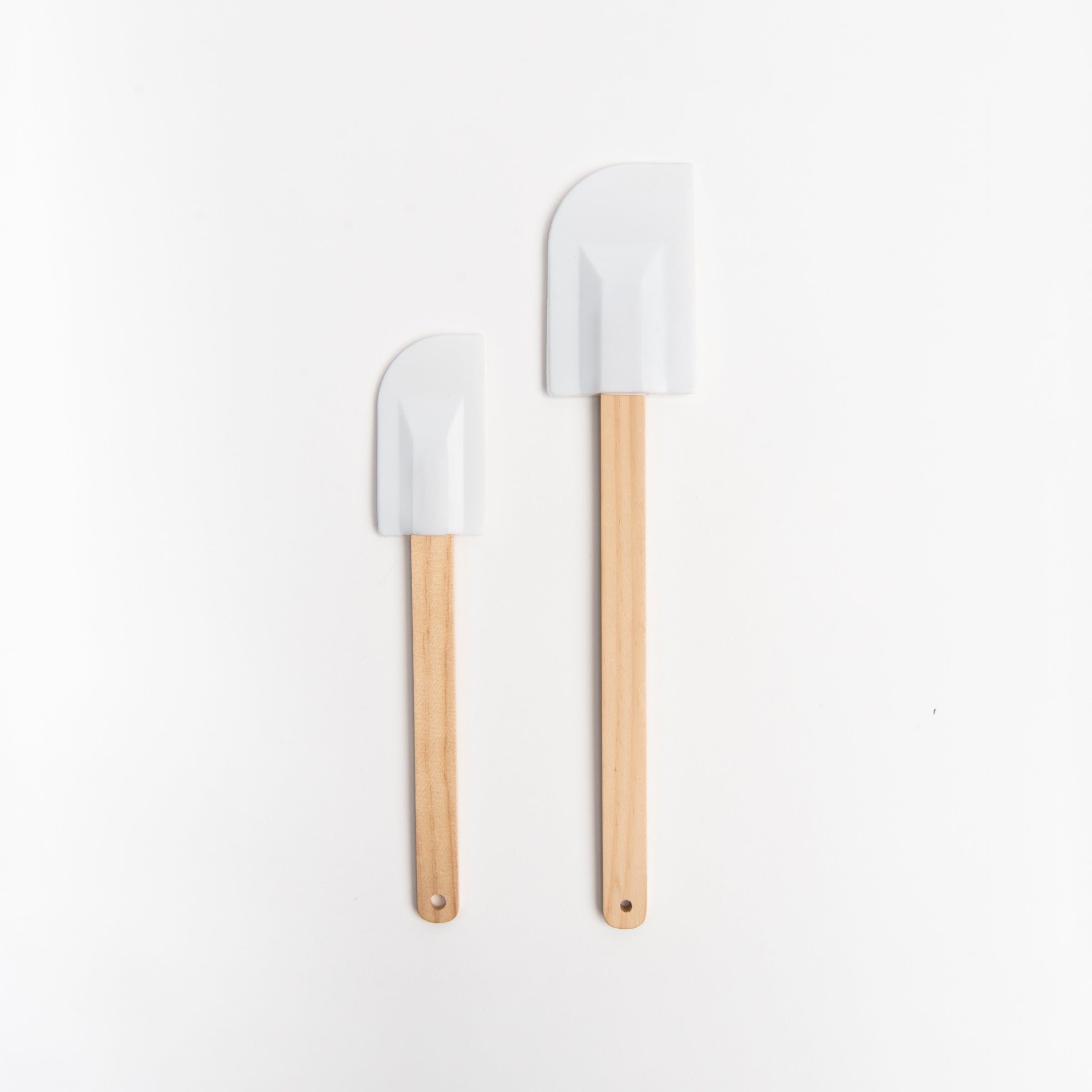 10 and 12 Inch Wood Spatula in White on a white background at Addison West