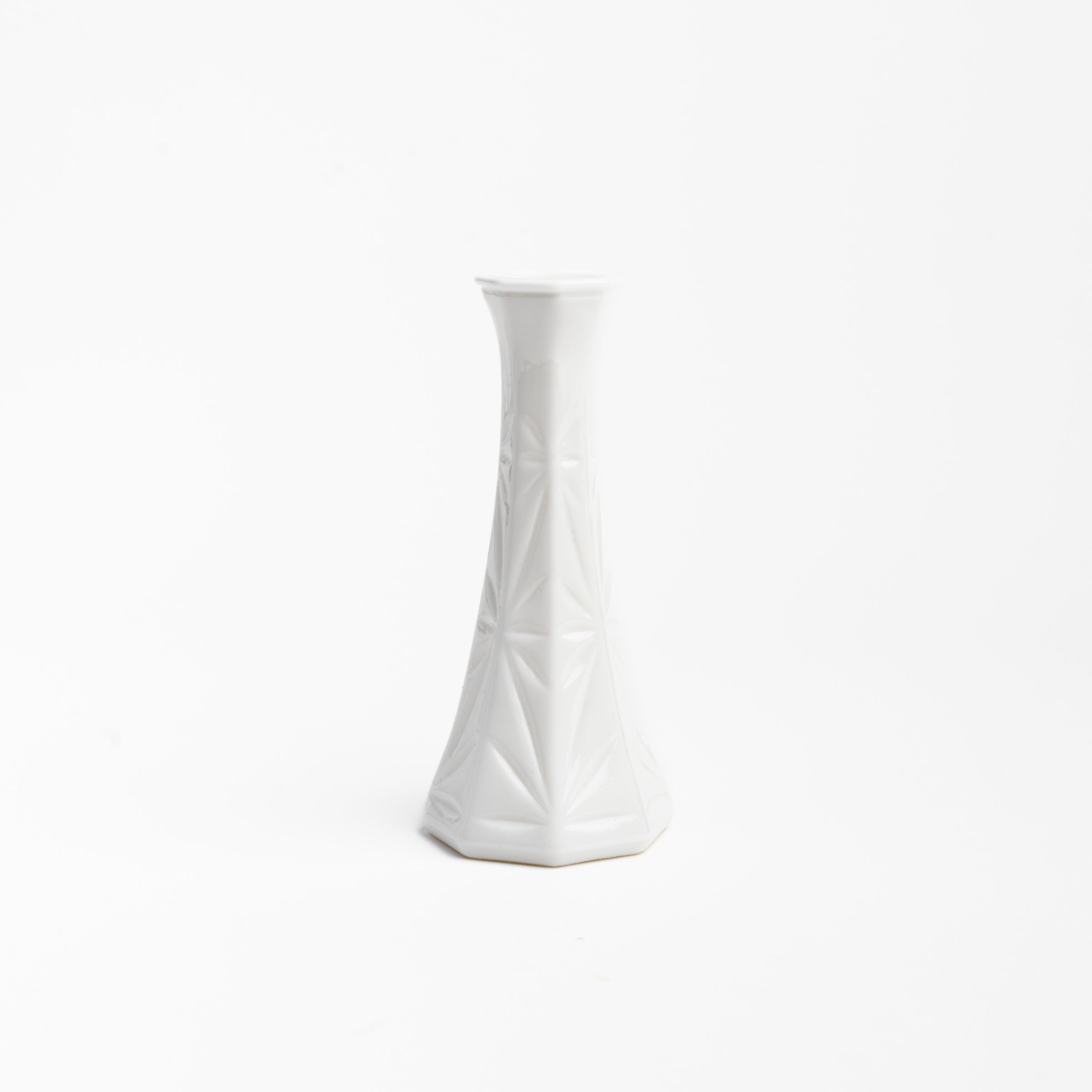 Vintage Small Starburst Milk Glass Bud Vase on a white background at Addison West