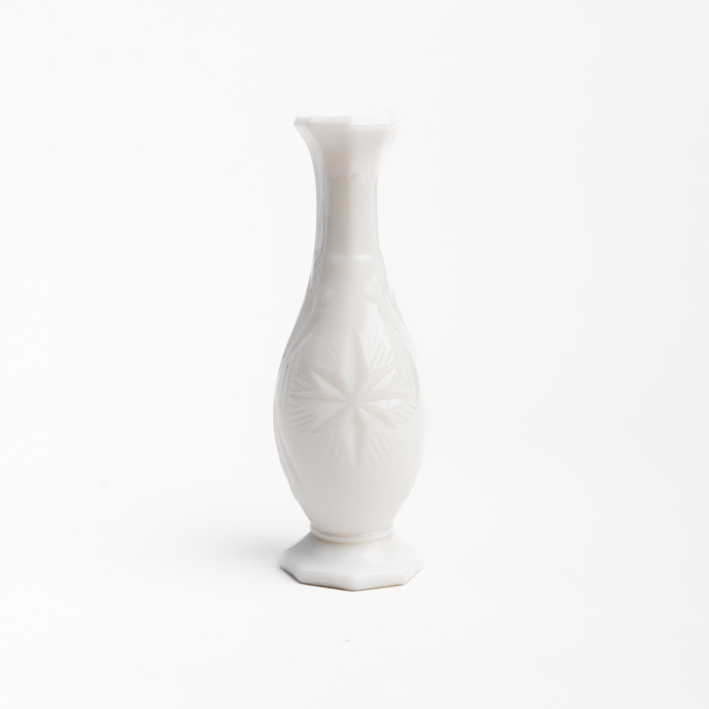 Vintage Oval Star Milk Glass Bud Vase on a white background at Addison West