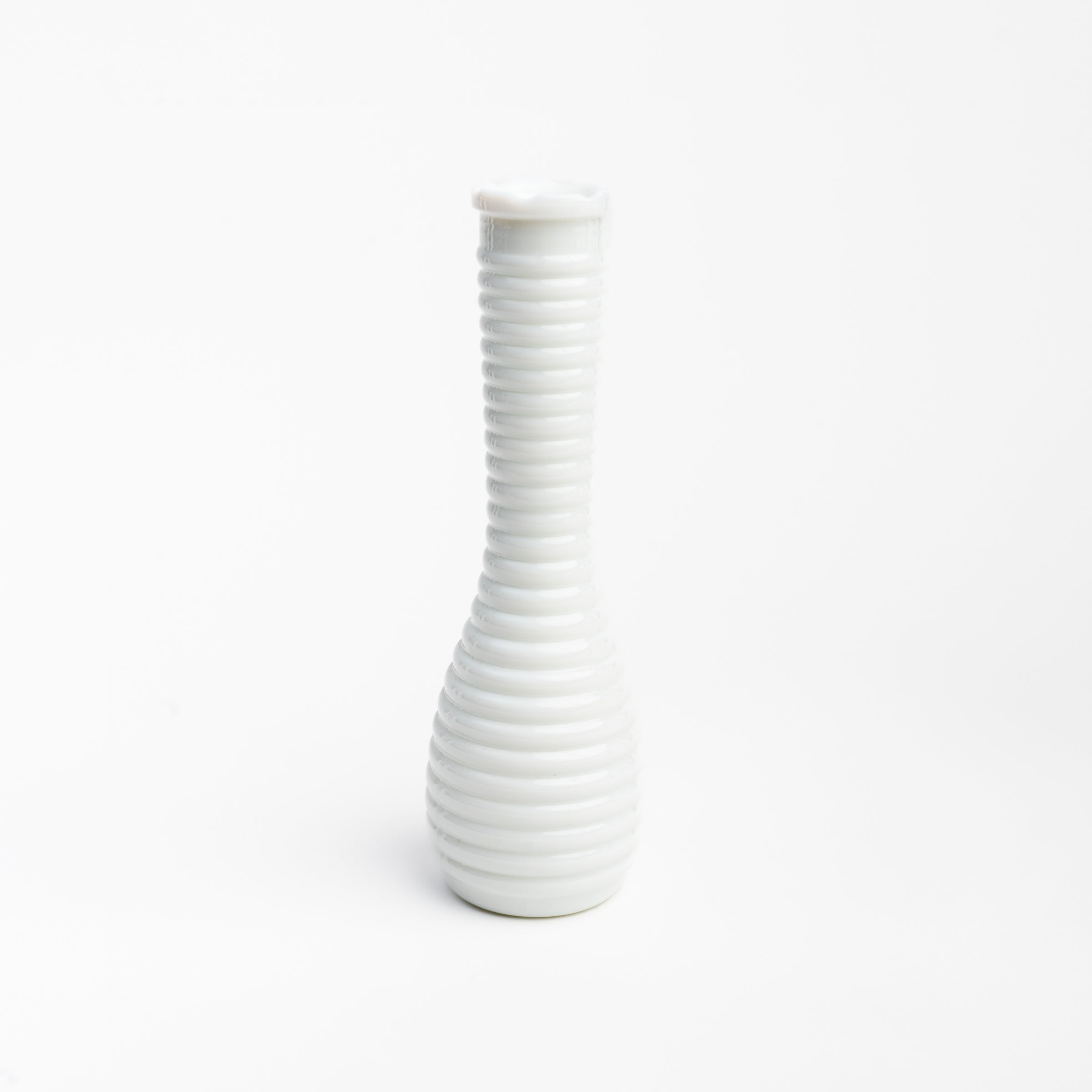 Vintage Ripple Milk Glass Bud Vase on a white background at Addison West