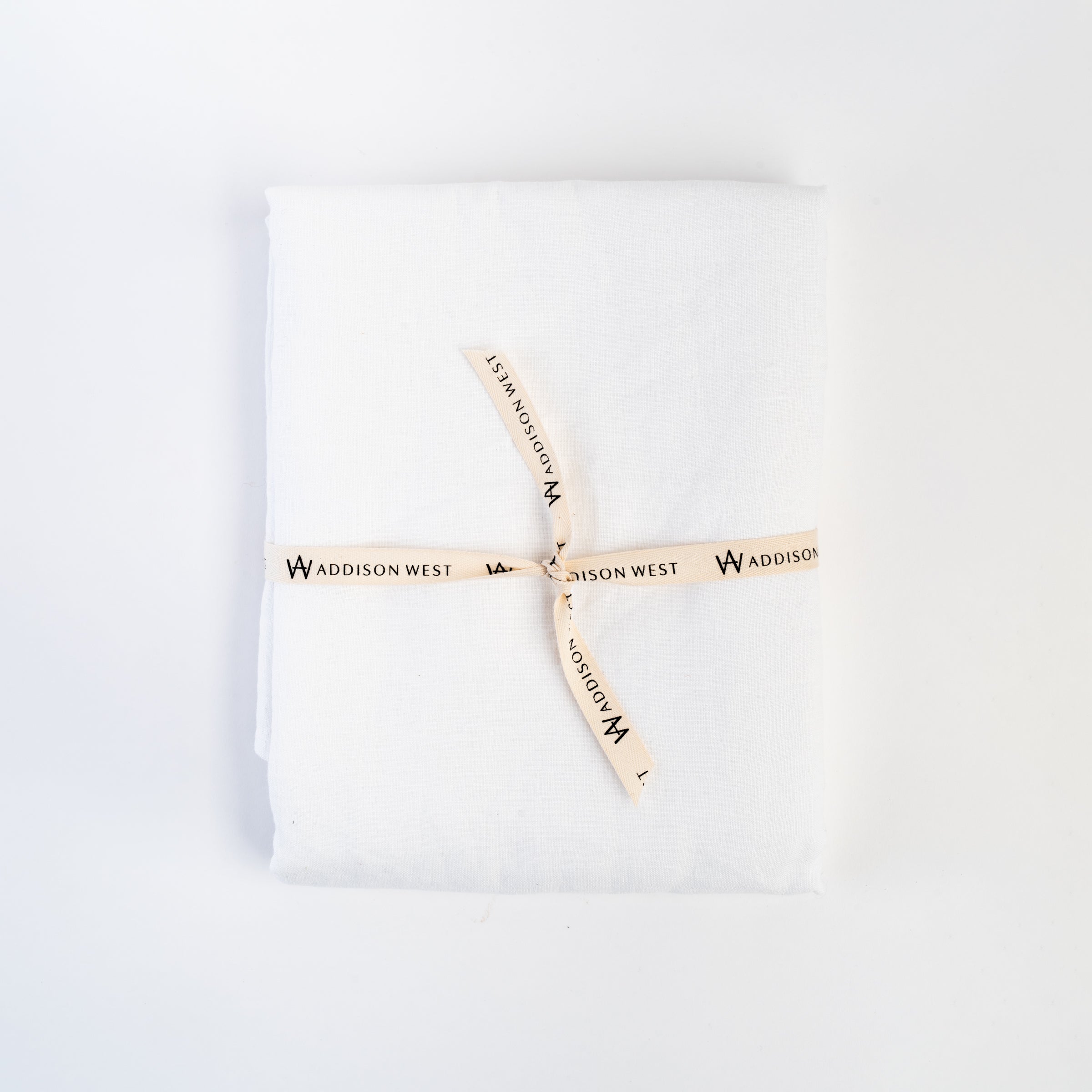 Linen Tablecloth - White on a white background at Addison West