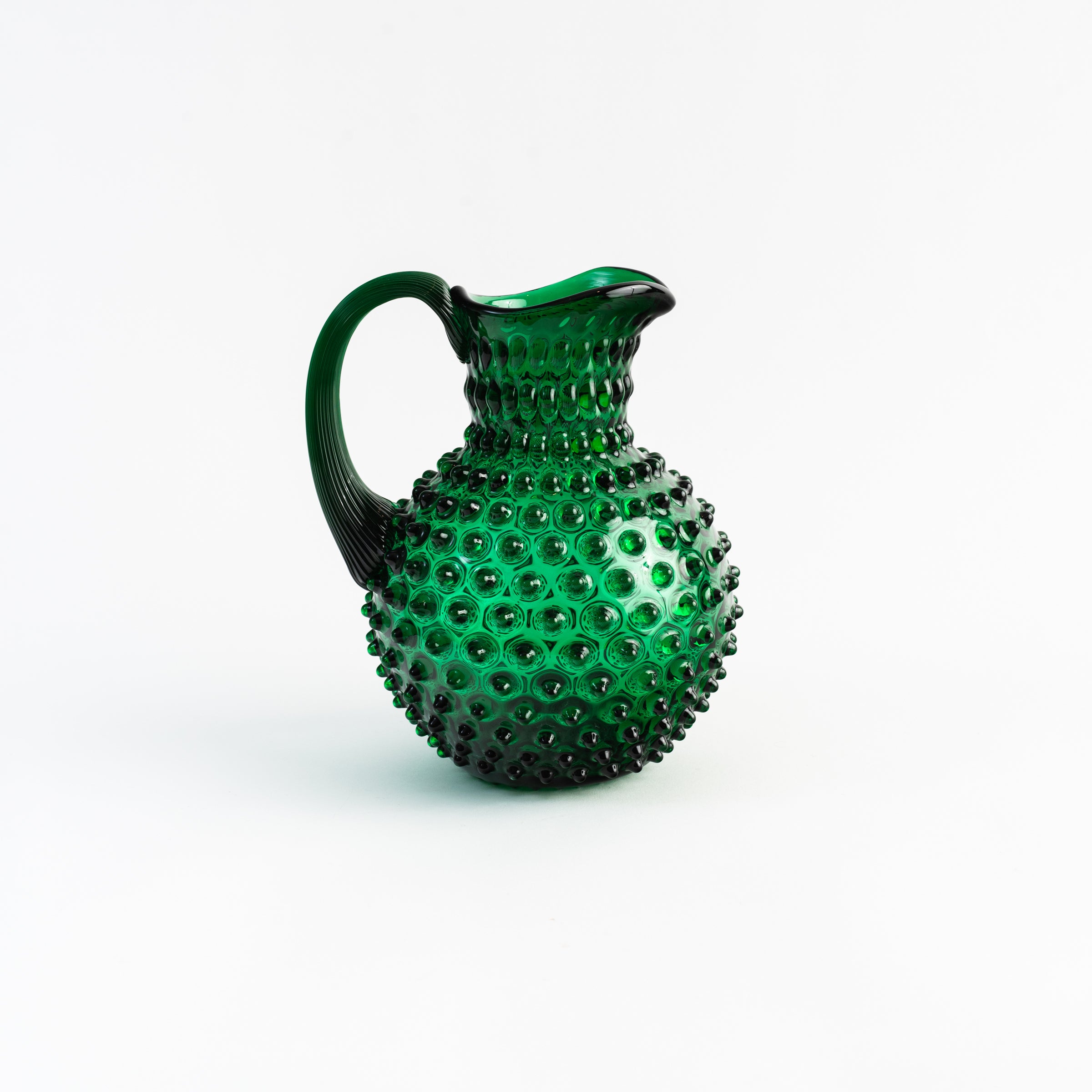 Green Hobnail Pitcher on a white background at Addison West