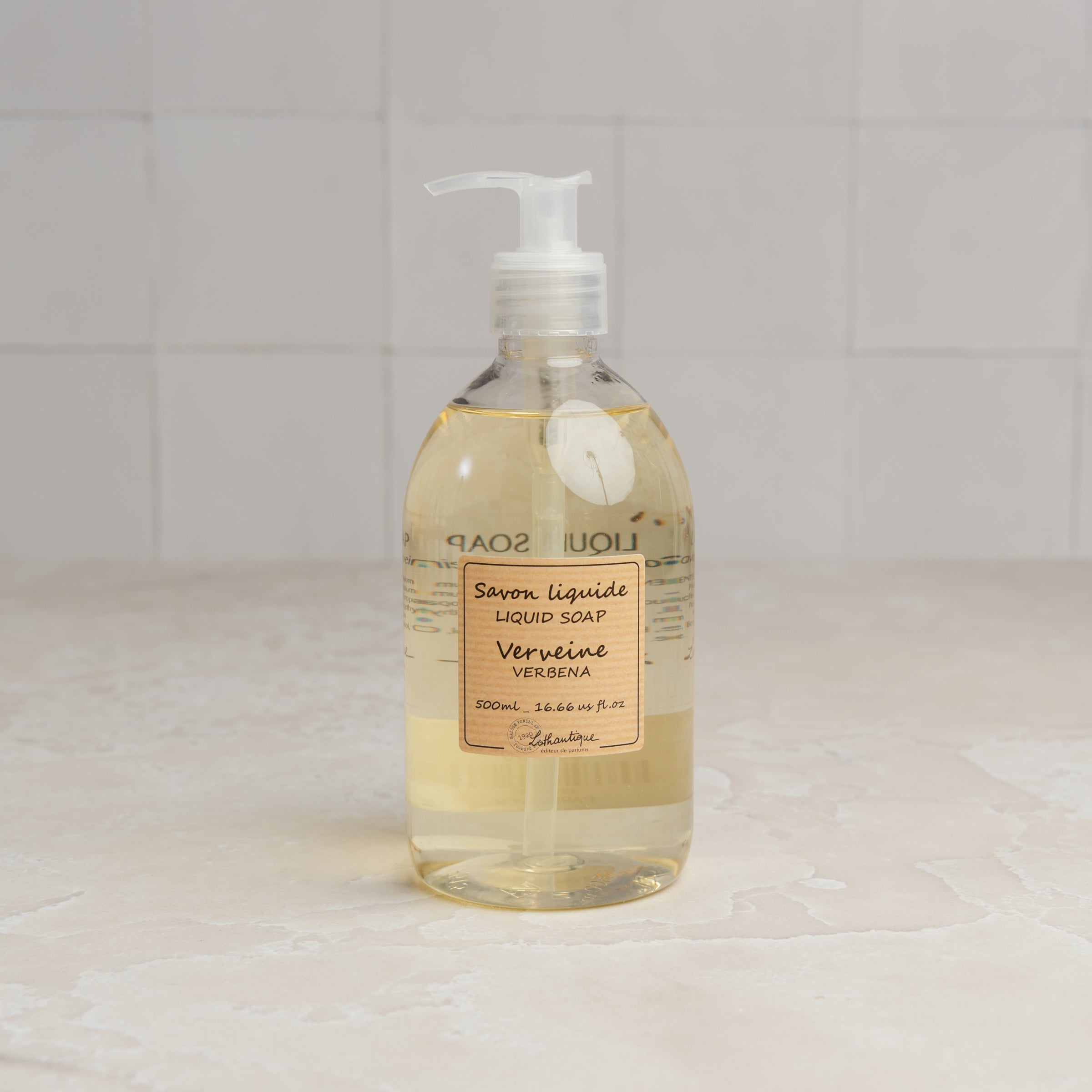 Lothantique Liquid Soap - Verbena on a marble table at Addison West