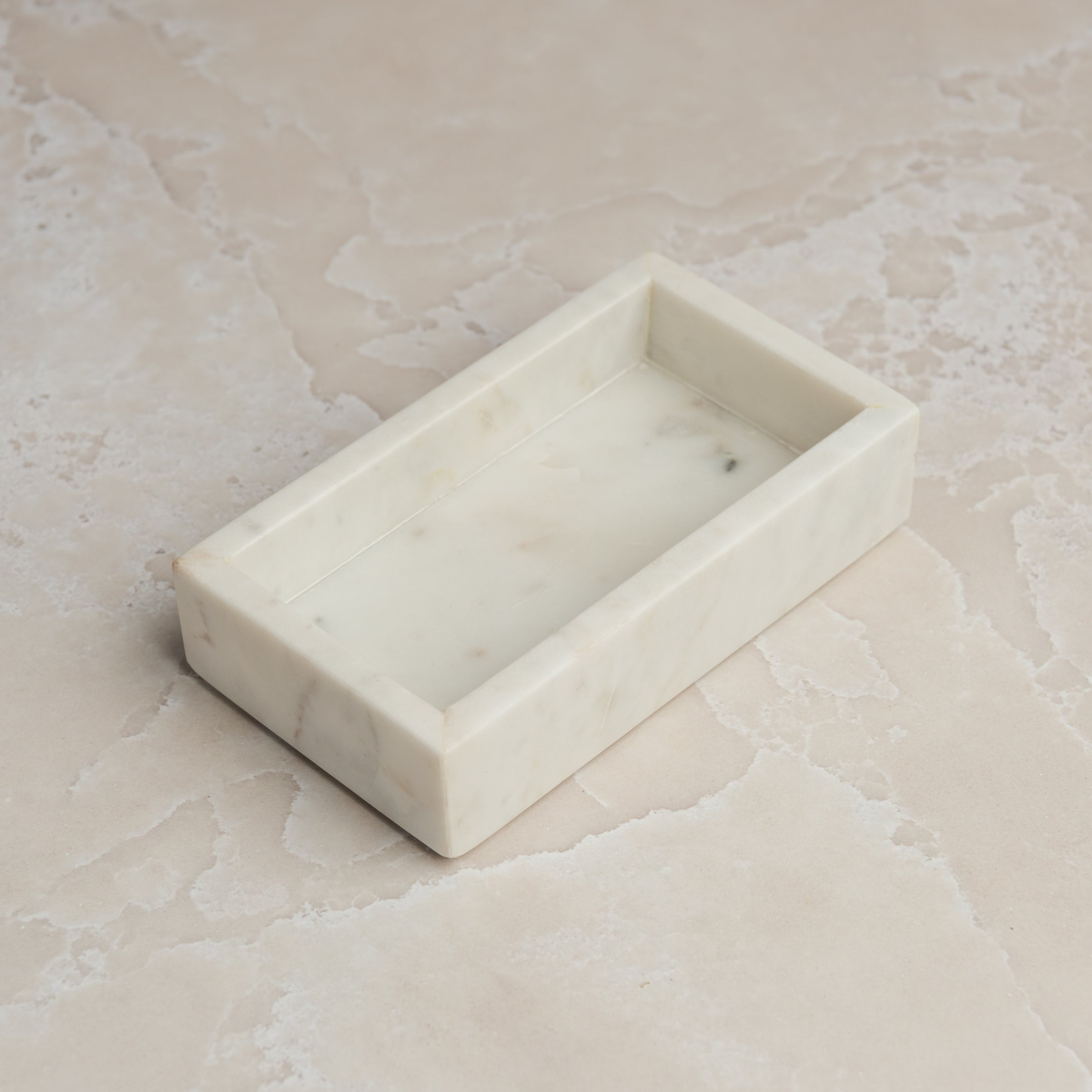 Lothantique Belle De Provence Marble Tray on a marble table at Addison West