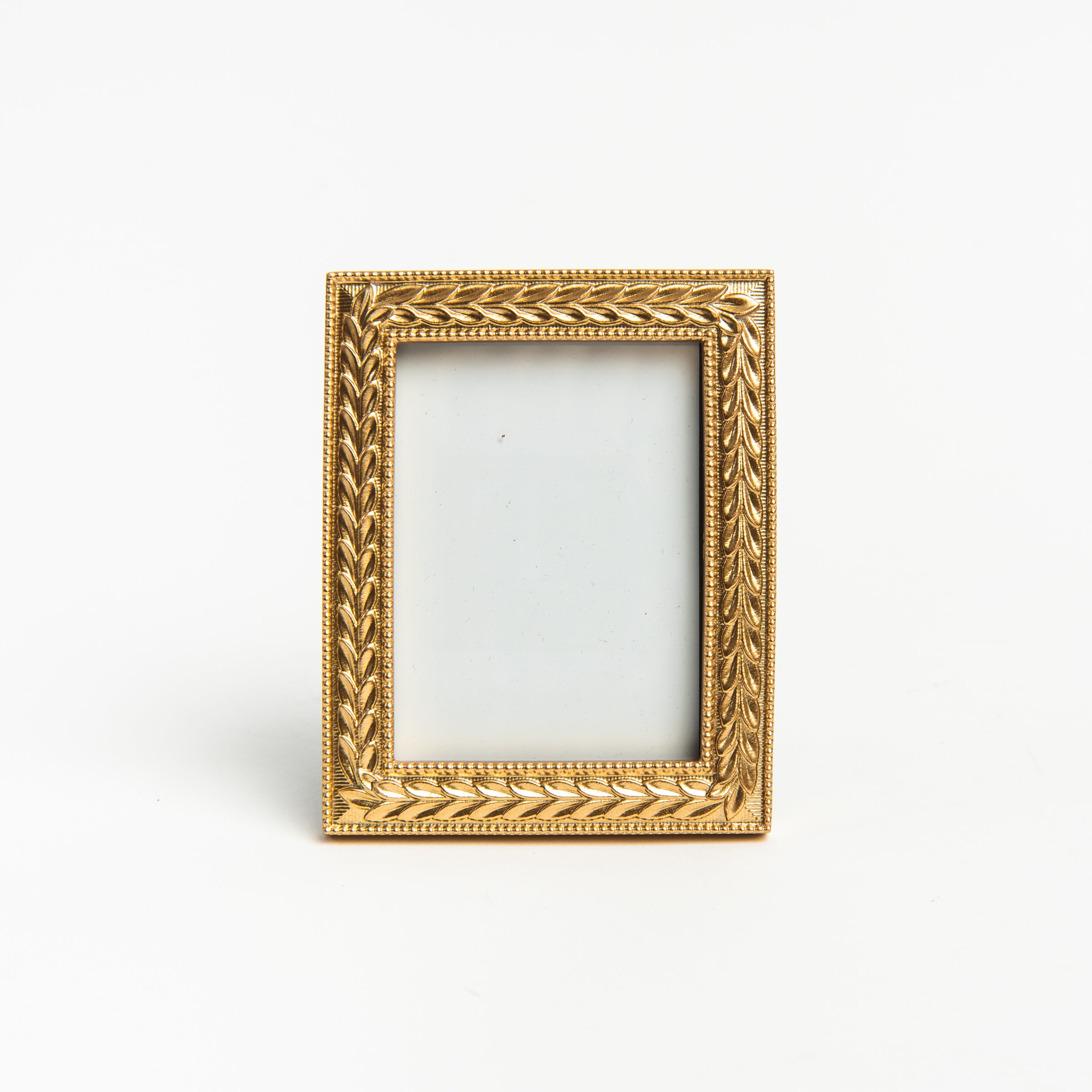 Mini Rectangle Golden Laurel Wreath Picture Frame on a white background at Addison West