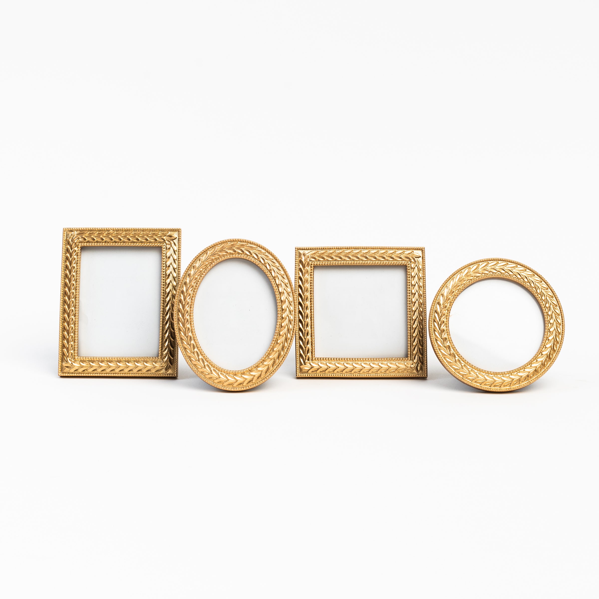 Mini Golden Laurel Wreath Picture Frames on a white background at Addison West