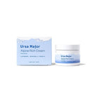 Box and jar of Ursa Major alpine rich cream on a white background