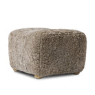 Amber Lewis x Four Hands Oslo Ottoman in Taupe Shearling on a white background at Addison West