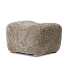 Amber Lewis x Four Hands Oslo Ottoman in Taupe Shearling on a white background at Addison West