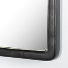 Close up of Amber Lewis x Four Hands Patz Mantel Mirror in Black Antique on a white background at Addison West