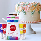 Ann Clark Food Coloring Gel 12-Pack in front of a pastel colored cake at Addison West