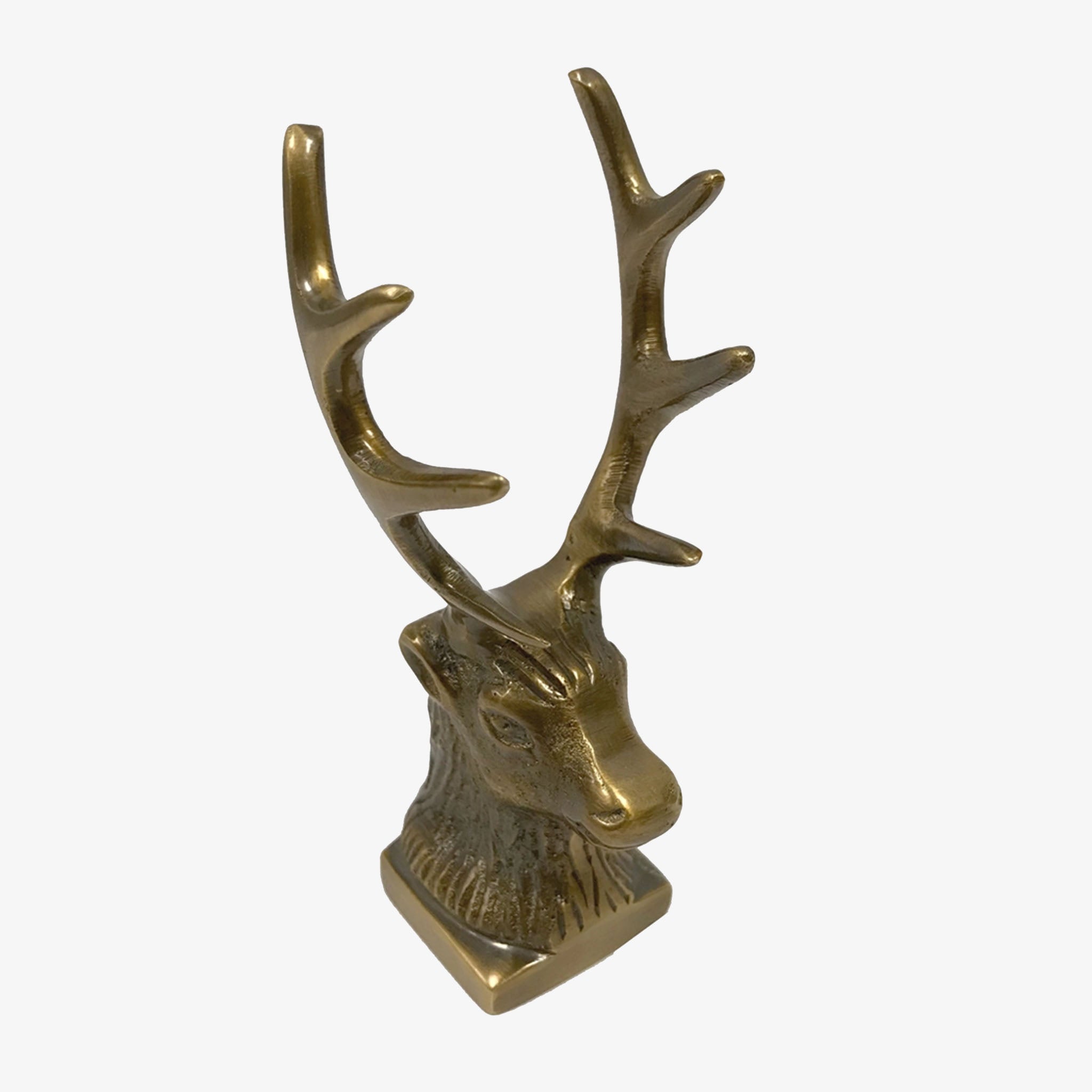 Antiqued Brass Stag statue or paperweight on a white background