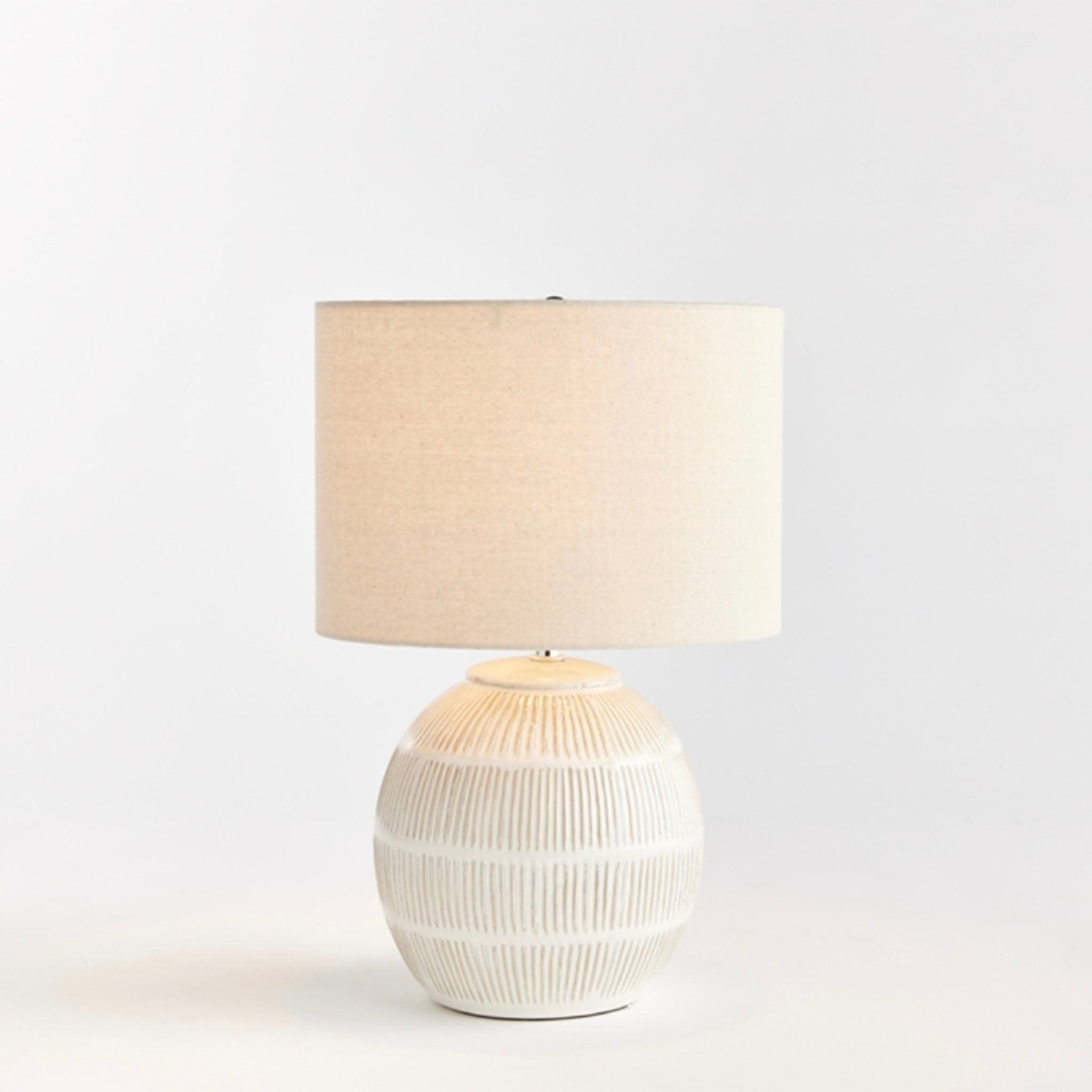 Napa Home and Garden Antoni white ceramic lamp with cream shade on a white background