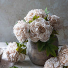 Abigail Ahern Faux Peony in Evening Dew in a grey vase at Addison West