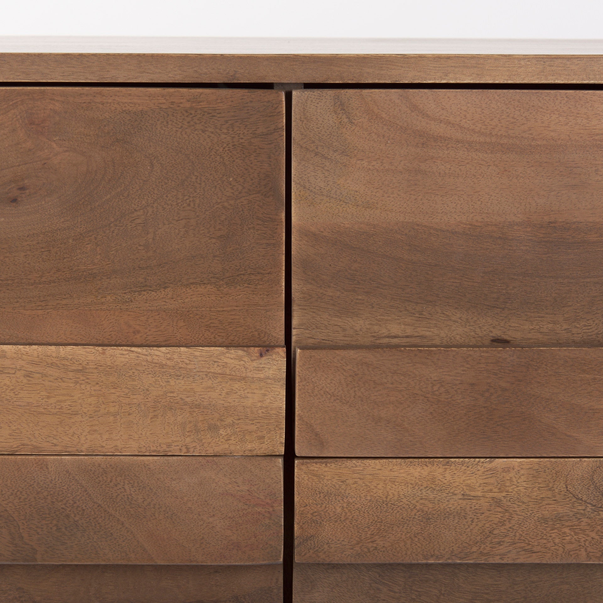 Close up of Astrid 71L x 17W x 30.3H Medium Brown Solid Wood 6 Drawer Sideboard on a white background