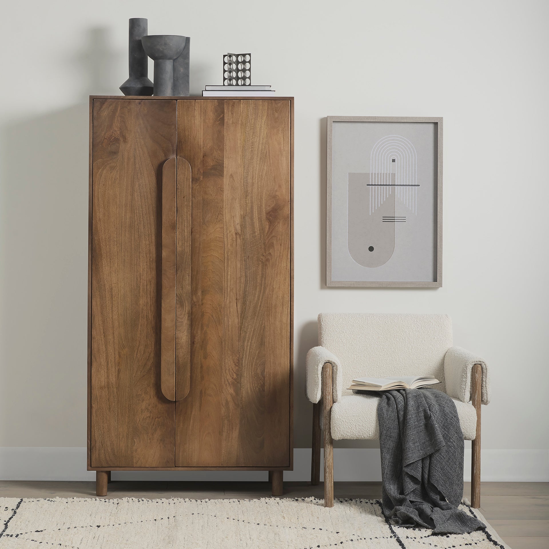 Astrid 36.0L x 17.0W x 70.0H Medium Brown Solid Wood Armoire in a modern farmhouse room