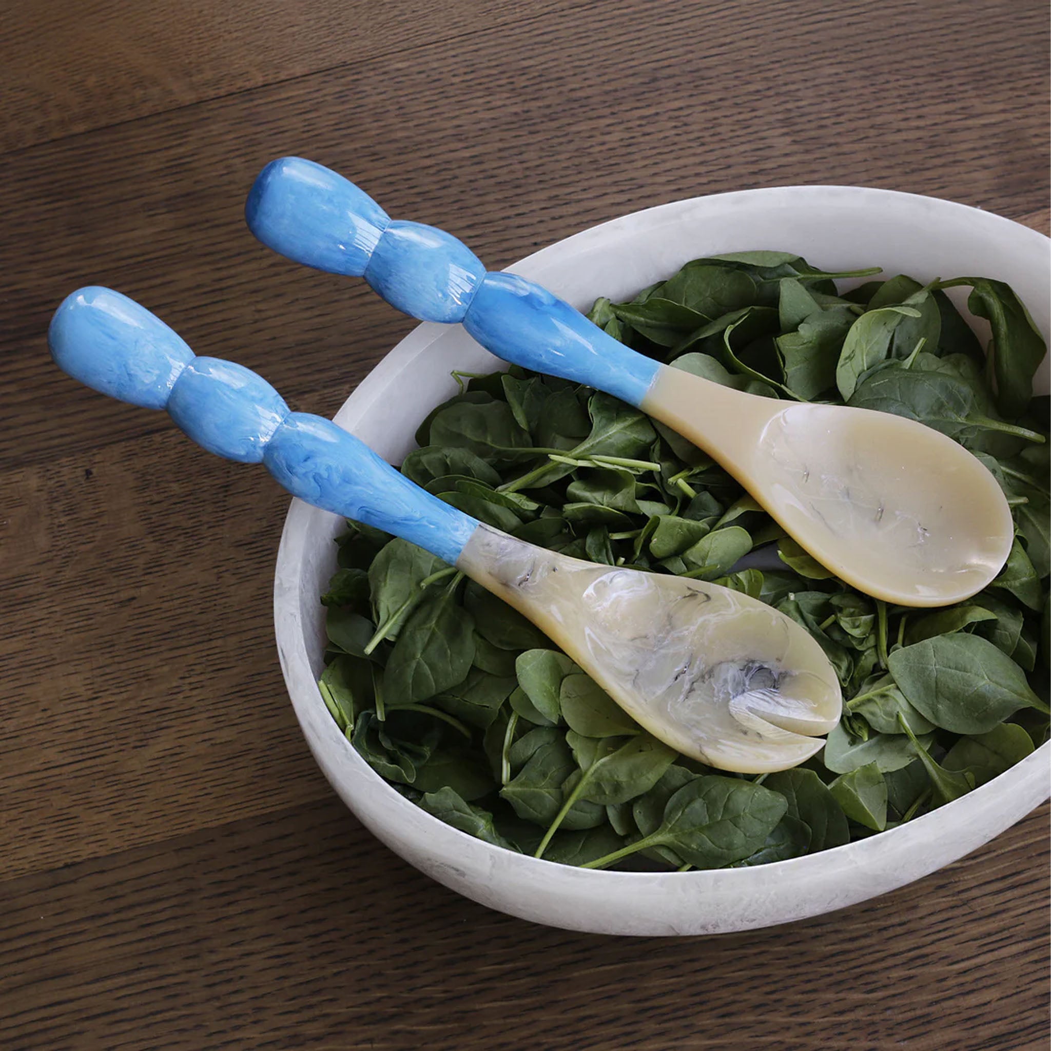 Beatriz Ball RESIN Rio Bubble Salad Servers in Blue in a bowl at Addison West