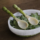 Beatriz Ball RESIN Rio Bubble Salad Servers in Green in a bowl at Addison West