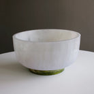 Beatriz Ball RESIN Rio Large Bowl with Base in White & Green on a white table at Addison West