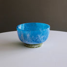 Beatriz Ball RESIN Rio Small Bowl with Base in Blue & Green on a white table at Addison West