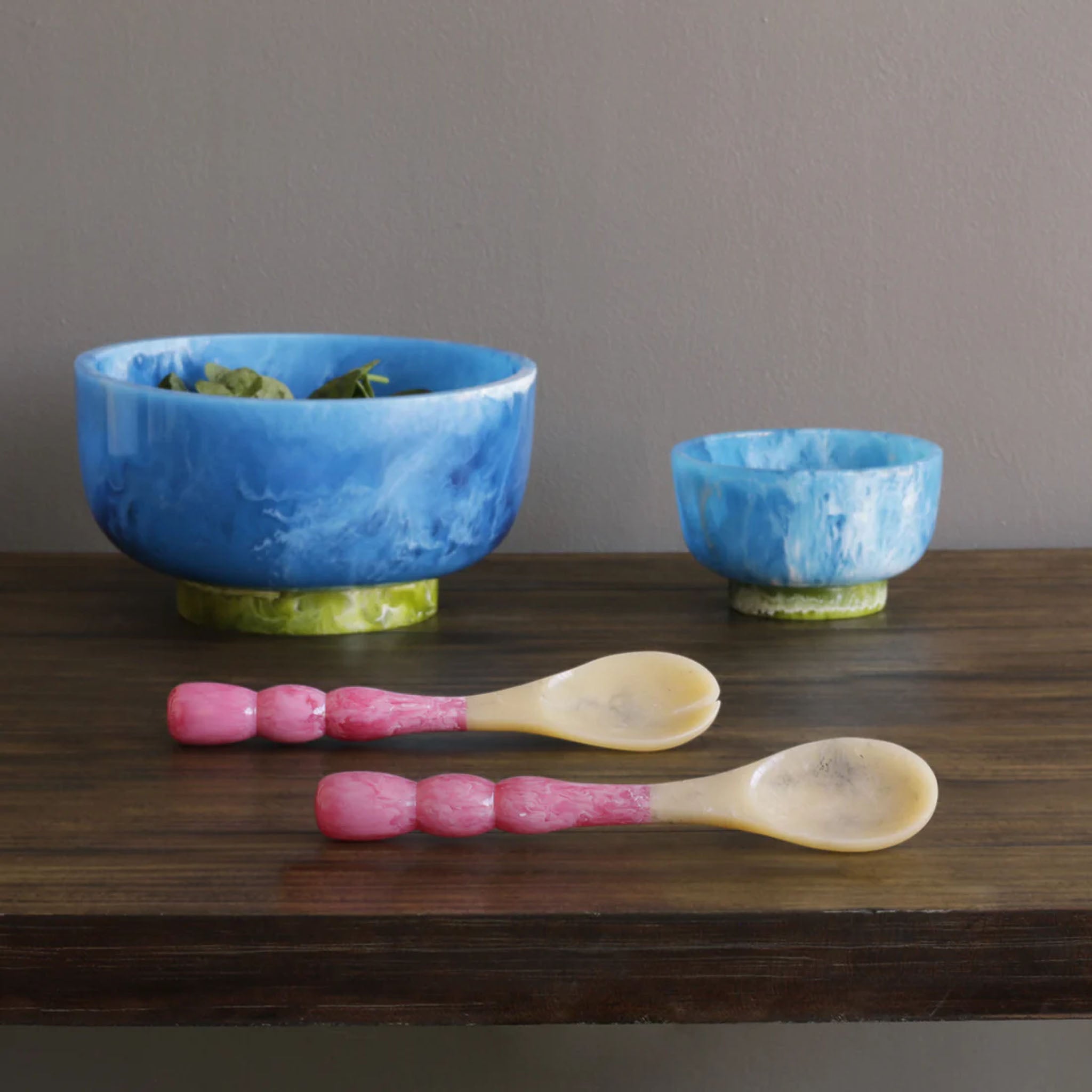 Beatriz Ball RESIN Rio Small Bowl with Base in Blue & Green on a white table at Addison West